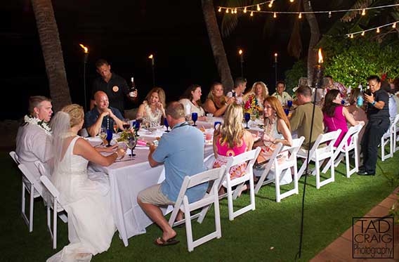 A catered beachfront wedding reception in Lahaina at the White House private estate.