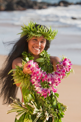 Hawaiian wedding lei - wearing a Maile Haku Lei and presenting an orchid lei to Maui wedding guests.