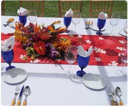 Full Service Maui Catering including matching bamboo utensils and tropical flowers for Maui catered events.