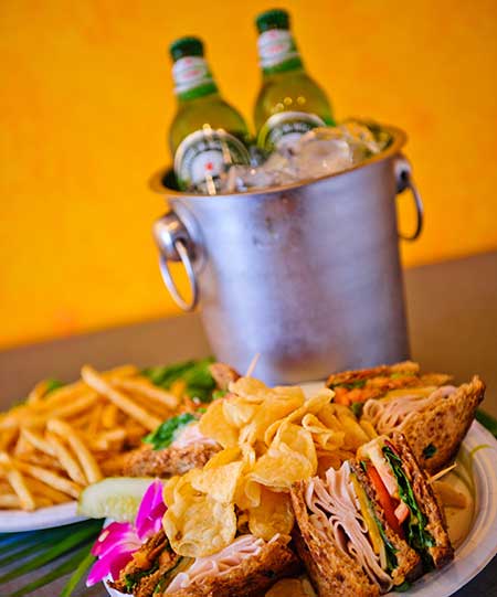 Turkey Club with fries and Heinekin at Kaanapali Restaurant.