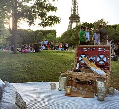 Indulge in a picnic under the Eiffel Tower from Picnics in Paris.