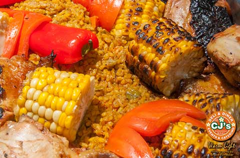 Grilled local vegetables include corn, red peppers and more to compliment the steak and shrimp for catered Maui bbq.