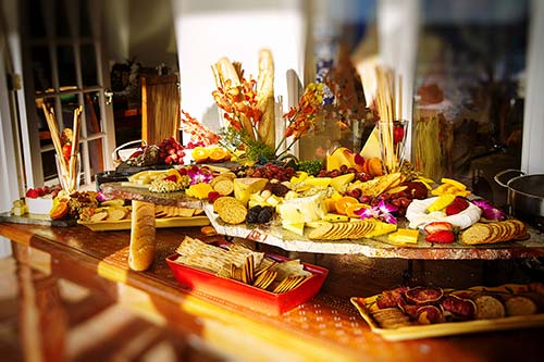 A West Maui wedding at the White House Lahaina private estate featured an internattional cheese display.