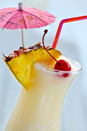 Pina Coloda cocketail with fresh tropical fruit for Maui wedding cocktails image.