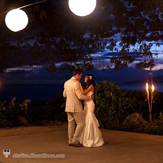 A couple dancing at their wedding reception on Maui.