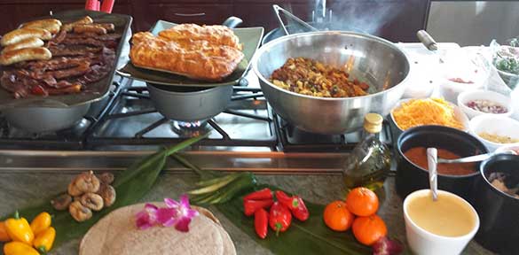 A catered dinner service with a Maui private chef cooking.