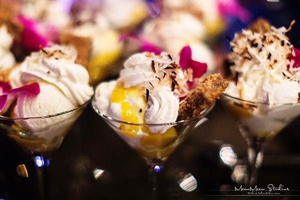 Dessert catering on Maui includes old fashioned ice cream sundaes topped with tropical fruits and nuts.